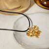 Wholesale Women's Stainless Steel And Titanium Steel Bow Pendant Necklace With Black Wax Rope And Electroplating Design