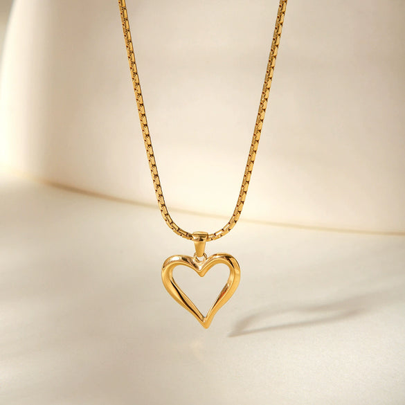 Wholesale Women's Stainless Steel And Titanium Steel Heartshaped Hollow Pendant Necklace With Electroplating Treatment