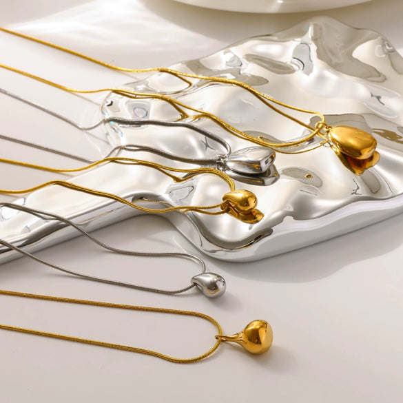 Wholesale Women's Stainless Steel And Titanium Steel Necklace With 18K Gold Water Drop Pendant And Round Snake Chain Pvd Furnace Vacuum Real Gold Plated
