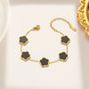 Wholesale Women's Stainless Steel And Titanium Steel Plant Fritillaria Fiveleaf Petal Jewelry Suit With Geometric Pattern And Gold Inlaid Treatment