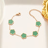 Wholesale Women's Stainless Steel And Titanium Steel Plant Fritillaria Fiveleaf Petal Jewelry Suit With Geometric Pattern And Gold Inlaid Treatment