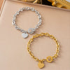 Wholesale Women's Stainless Steel Bracelet With Heartshaped And Ot Buckle Real Gold Plated Geometric Style Featuring Letters Numbers And Text