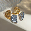 Wholesale Women's Stainless Steel Conch Spiral Pattern Vortex Shape Earrings With Animals Zodiac Style And Electroplating Treatment