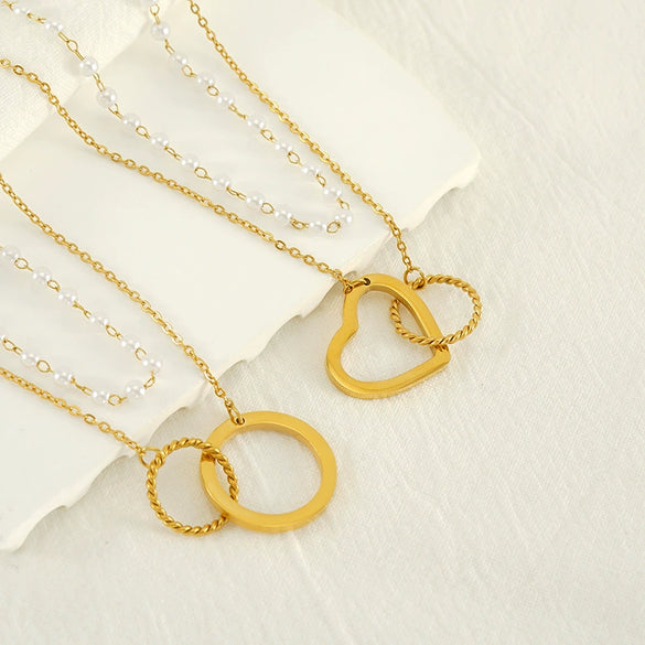Wholesale Women's 316L Stainless Steel Double Pearl Necklace With Heart And Geometric Pattern Hollow Pendant And Electroplating Treatment