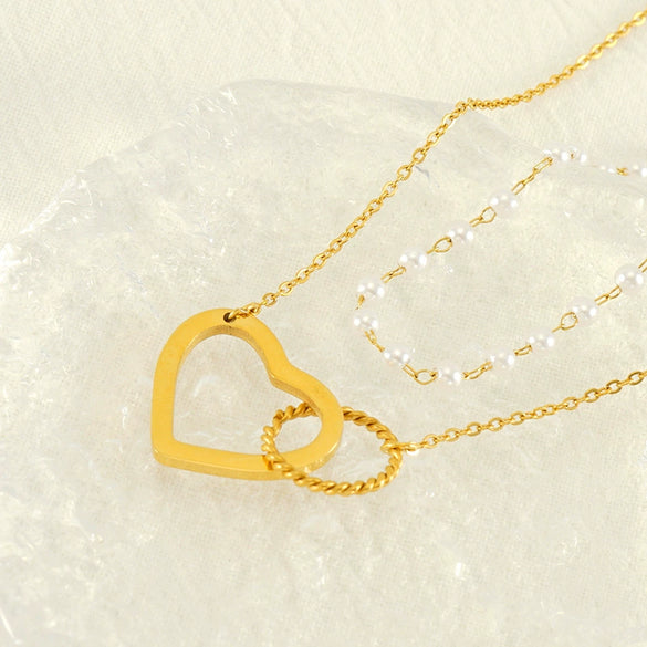 Wholesale Women's 316L Stainless Steel Double Pearl Necklace With Heart And Geometric Pattern Hollow Pendant And Electroplating Treatment