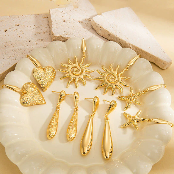 Wholesale Women's Stainless Steel Earrings With Flower Pattern And Electroplating Treatment In Water Drop Shape