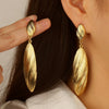 Wholesale Women's Stainless Steel Earrings With Flower Pattern And Electroplating Treatment In Water Drop Shape
