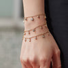 Wholesale Women's Stainless Steel Electroplated Necklace And Bracelet Set With Cross Crown Roman Numerals Pattern