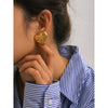 Wholesale Women's Stainless Steel Electroplated Peach Heart Earrings Jewelry With Stitching Texture