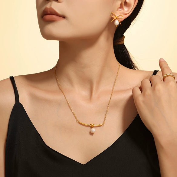 Wholesale Women's 316L Stainless Steel Elegant Freshwater Pearl French Hollow Bow Earrings And Necklace Set With Electroplating