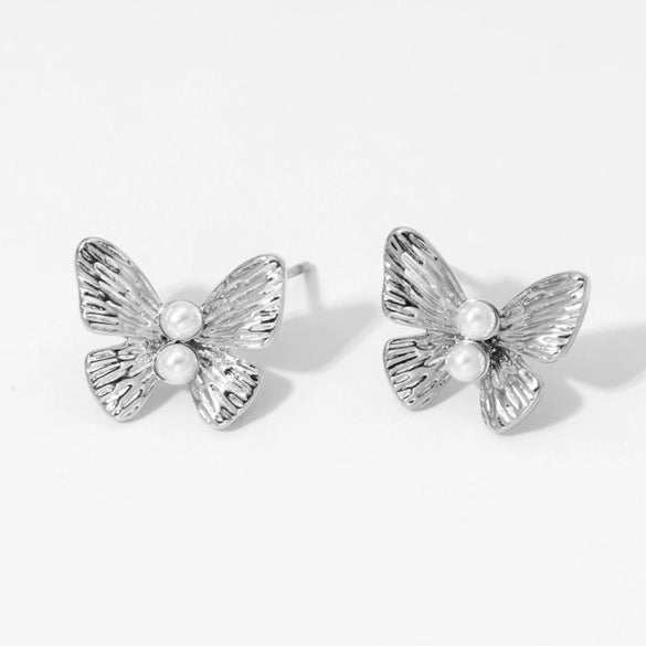 Wholesale Women's Stainless Steel Flower And Bow Earrings With Electroplating