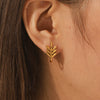 Wholesale Women's Stainless Steel Geometric And Flower Patterned Electroplated Stud Earrings