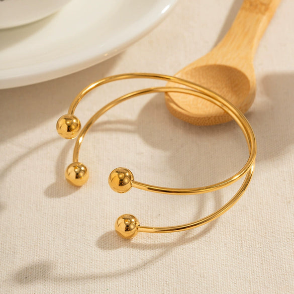 Wholesale Women's Stainless Steel Geometric Double Ball Open Bracelet With Cross Design And Electroplating Treatment