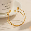 Wholesale Women's Stainless Steel Geometric Double Ball Open Bracelet With Cross Design And Electroplating Treatment