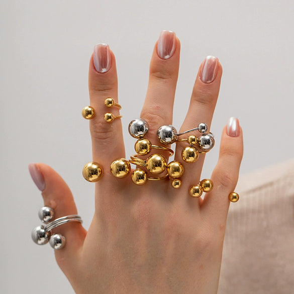 Wholesale Women's Stainless Steel Geometric Exaggerated Three Spherical Opening Ring Jewelry With Electroplating And French Retro Style