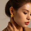 Wholesale Women's Stainless Steel Geometric Pleated Exaggerated Retro Earrings With Electroplating