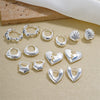 Wholesale Women's Stainless Steel Geometric Ushaped Hollow Exaggerated Simple Silver Glossy Electroplated Earrings