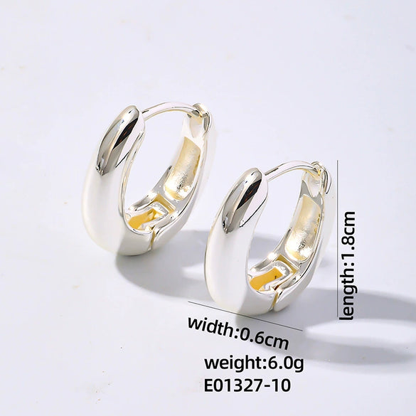 Wholesale Women's Stainless Steel Geometric Ushaped Hollow Exaggerated Simple Silver Glossy Electroplated Earrings
