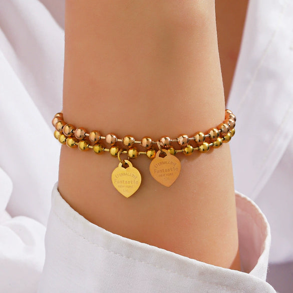 Wholesale Women's Stainless Steel Heartshaped Love Bracelet With Round Beads And Electroplating