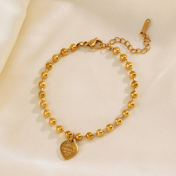 Wholesale Women's Stainless Steel Heartshaped Love Bracelet With Round Beads And Electroplating
