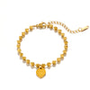 Wholesale Women's Stainless Steel Heartshaped Love Bracelet With Round Beads And Electroplating