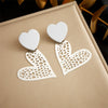 Wholesale Women's Stainless Steel Heartshaped Pendant Jewelry Earrings With Electroplating And Fashion Simple Hollow Design