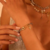 Wholesale Women's Stainless Steel 18K Gold Electroplated Geometric Cross Bracelet With Pin Embellishments