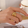 Wholesale Women's Stainless Steel Leaf And Flower Rings With Gold Electroplating