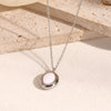 Wholesale Women's Stainless Steel Light Luxury Niche Design Cross Cat Eye Drop Oil Necklace Earrings Suit With Ellipse Pattern And Vacuum Real Gold Electroplating In Pvd Furnace