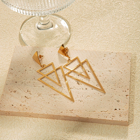 Wholesale Women's Stainless Steel Light Luxury Niche Design Overlapping Hollow Triangle Earrings With Leaves Pattern And Electroplating Treatment