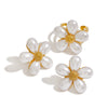 Wholesale Women's Stainless Steel Pearl Fivepetal Flower Opening Ring With Geometric Pattern And Electroplating Design