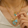 Wholesale Women's Stainless Steel Pearl Necklace And Shell Earrings Set With Lotus Painted Oil Drop Pendant 18K Vacuum Gold Plated