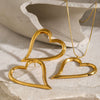 Wholesale Women's Stainless Steel Pendant Necklace And Earrings With Twisted Love Line Design