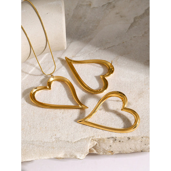 Wholesale Women's Stainless Steel Pendant Necklace And Earrings With Twisted Love Line Design