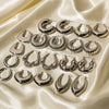 Wholesale Women's Stainless Steel Smooth Hollow Hoop Earrings With Geometric Design And Electroplating