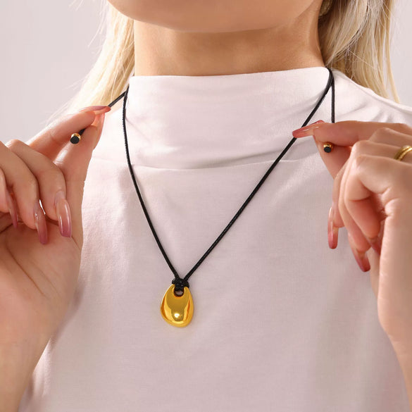 Wholesale Women's Stainless Steel Water Drops Shaped High Polished Jewelry With Black Leather Rope Pull Adjusting And Electroplated Woolen Chain For Autumn And Winter