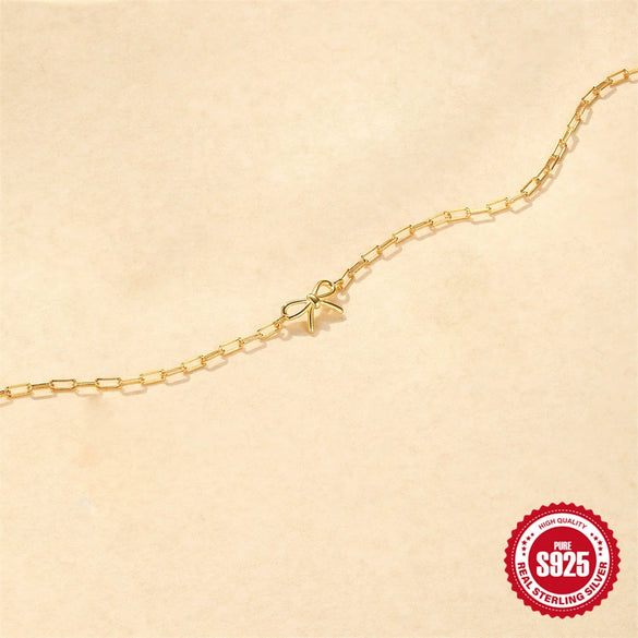 Wholesale Women's 925 Sterling Silver Geometric Bow Knot Paper Clip Bracelet With Electroplating And Real Gold Plating Simple Style