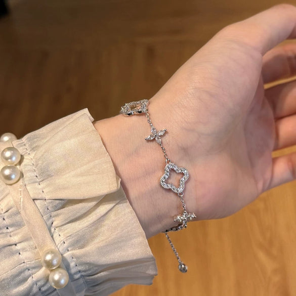 Wholesale Women's 925 Sterling Silver Light Luxury Style Fourleaf Clover Hollow Bracelet With Horse Eye Stone And Electroplating