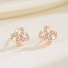 Wholesale Women's 925 Sterling Silver Rotating Windmill Flower Four Leaf Clover Geometric Style Ear Studs
