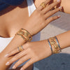 Wholesale Women's Sweet And Cool Style Stainless Steel Titanium Steel Electroplated Flower Curve Bracelet Ring Jewelry