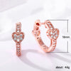 Wholesale Women's Sweet Cool Style Heart Shaped Copper Earrings Inlaid With Zircon