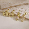 Wholesale Women's Sweet Copper Inlaid Pearl Animal Zodiac Bow Earrings
