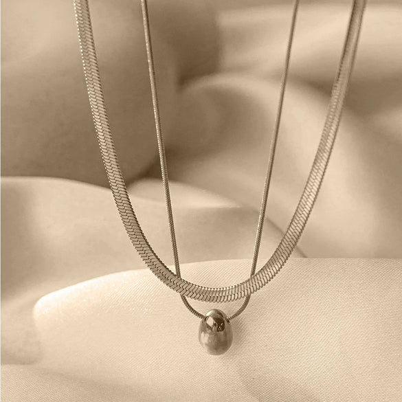 Wholesale Women's Sweet Fashionable Nonfading Electroplated Titanium Steel Necklace With Heart And Flower Patterns