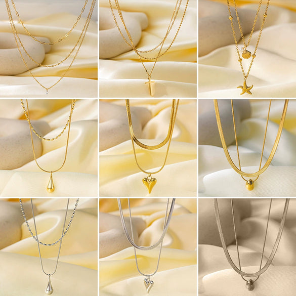 Wholesale Women's Sweet Fashionable Nonfading Electroplated Titanium Steel Necklace With Heart And Flower Patterns