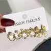 Wholesale Women's Sweet Geometric Artificial Pearl And Alloy Fishtail Moon Earrings Set With Pearl Inlaid