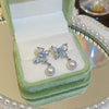 Wholesale Women's Sweet Geometric Copper And 925 Silver Earrings Set With Pearls