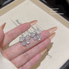 Wholesale Women's Sweet Geometric Copper And 925 Silver Earrings Set With Pearls