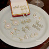 Wholesale Women's Sweet Geometric Copper And 925 Silver Earrings Set With Pearls