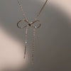 Wholesale Women's Sweet Retro Titanium Steel Bow Necklace With Gold Chain And Electroplating