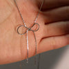 Wholesale Women's Sweet Retro Titanium Steel Bow Necklace With Gold Chain And Electroplating
